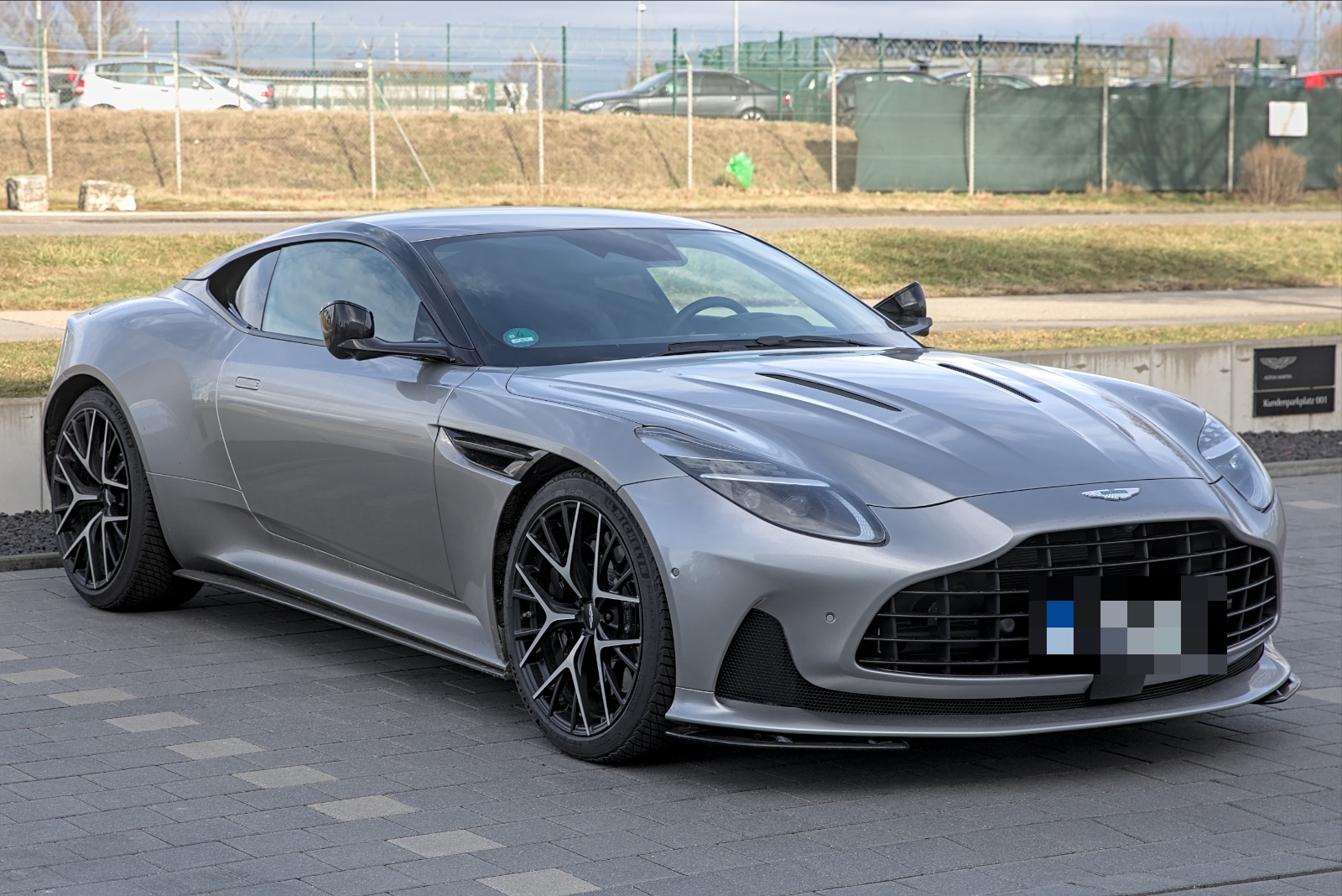 Aston Martin DB12. Photo: Alexander-93, CC BY-SA 4.0, via Wikimedia Commons; number plate blurred per our privacy policy.