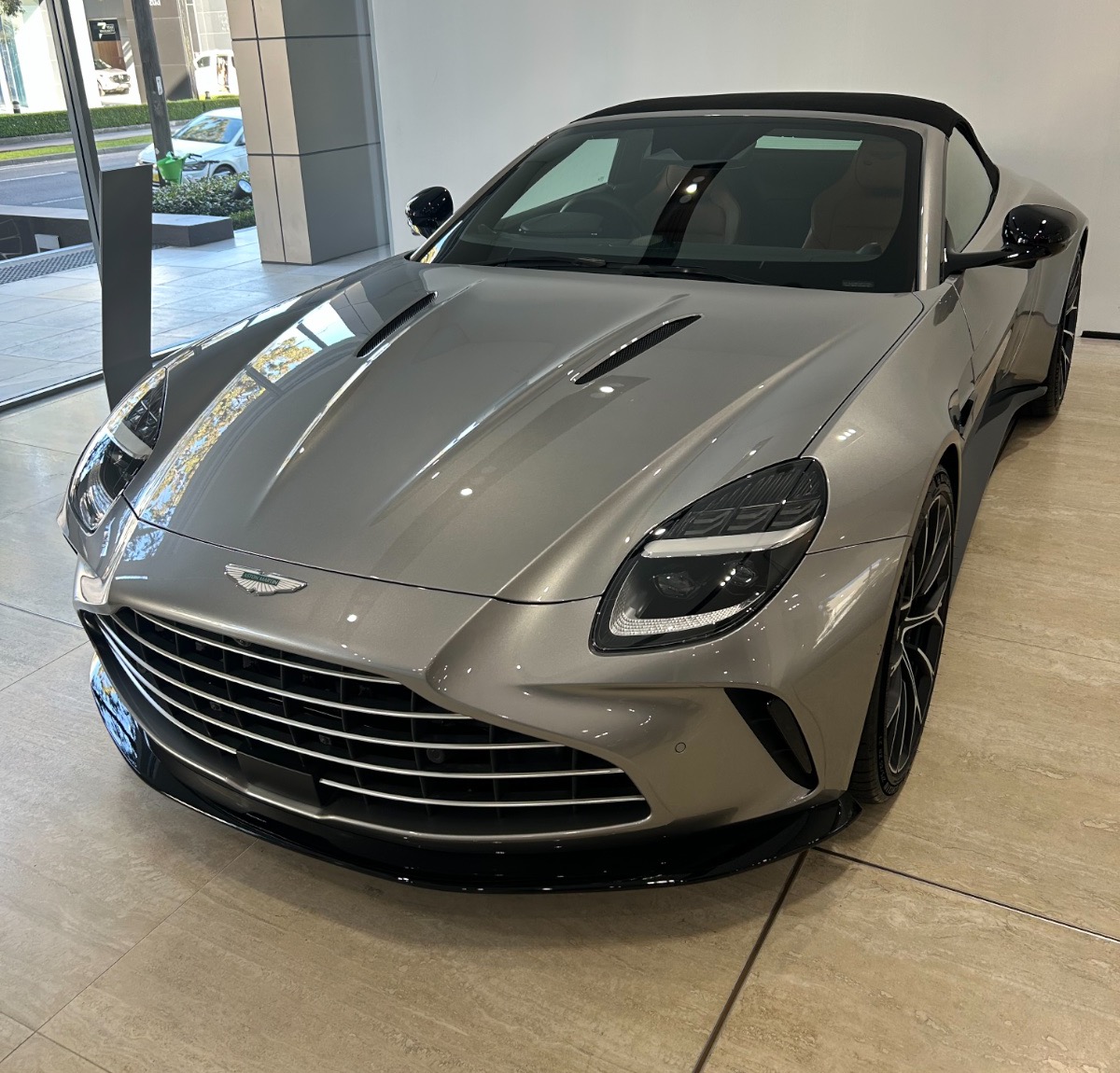 An Aston Martin Vantage Roadster in tungsten grey, photographed by us at Aston Martin Sydney. Photography: Queen of Cars.